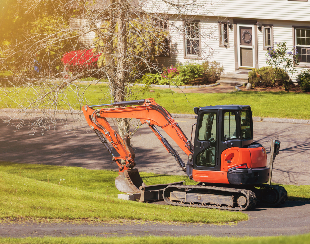 mini excavator in urban area